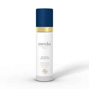 Pureday En cylindrisk hvid og guld flaske Økologisk Dag creme - Infinite Quentessence 50ml med en blå hætte, isoleret på en almindelig hvid baggrund.